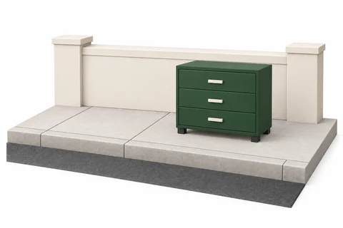 A dresser on the sidewalk behind the curb, with open access from the street.